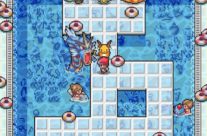 The trainer stands on a path through Cerulean Gym’s blue pools